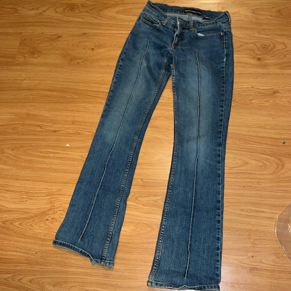 Bebe distressed Jean with flared bottoms